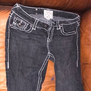 Boot cut black jeans with white thread